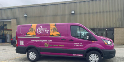 Purple all electric Ford moving van